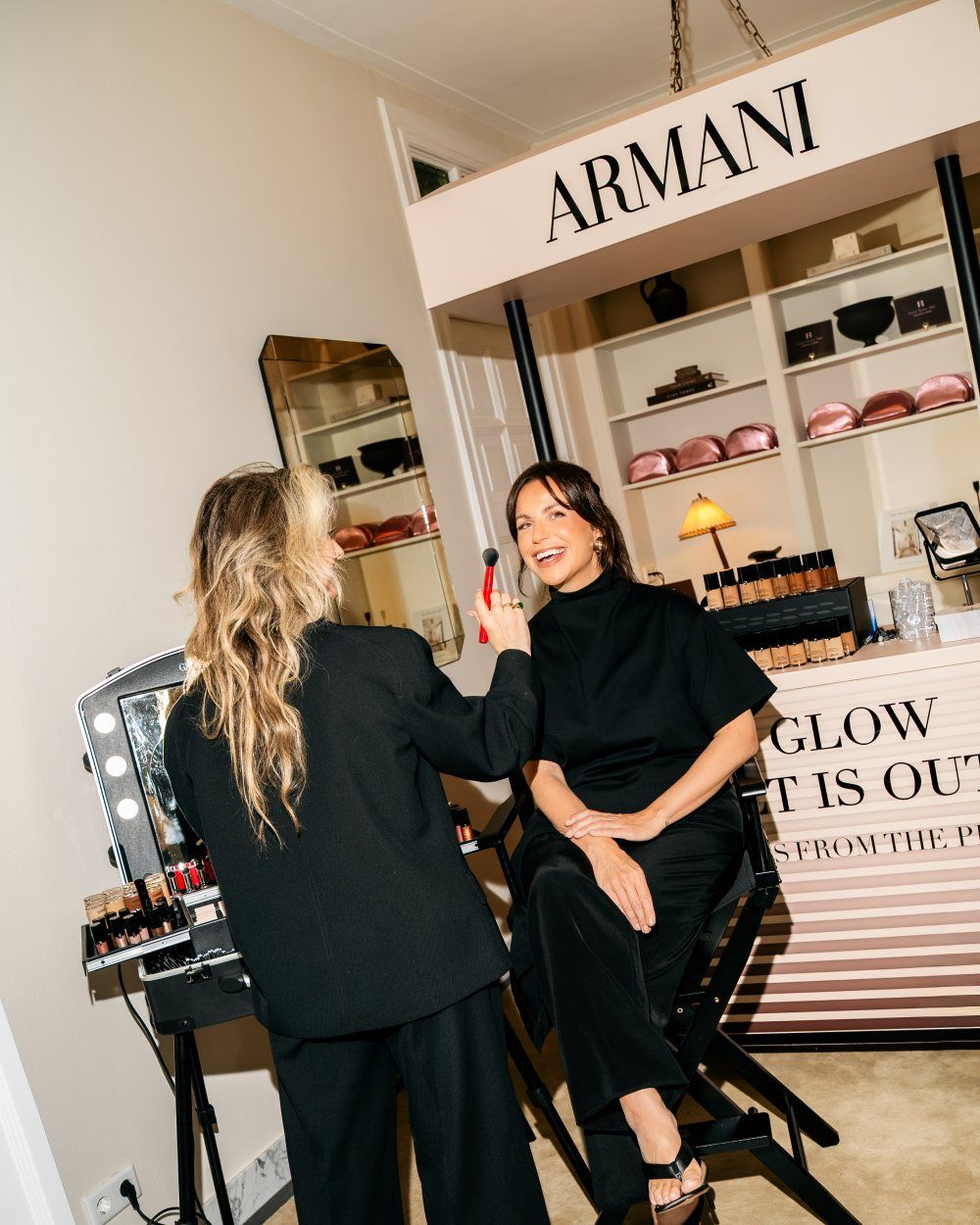A make-up artist at work at the Armani beauty stand during a CreativeGrounds x FI Business members evening